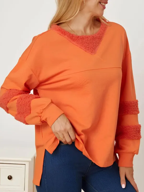 High-Low Round Neck Long Sleeve Sweatshirt sold by Charming Charlie