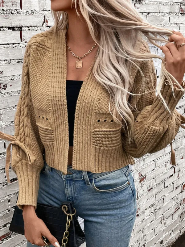 Cable-Knit Tied Open Front Lantern Sleeve Cardigan sold by Charming Charlie