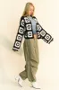 Davi & Dani Full Size Two Tone Flower Square Crochet Open Front Cardigan sold by Charming Charlie