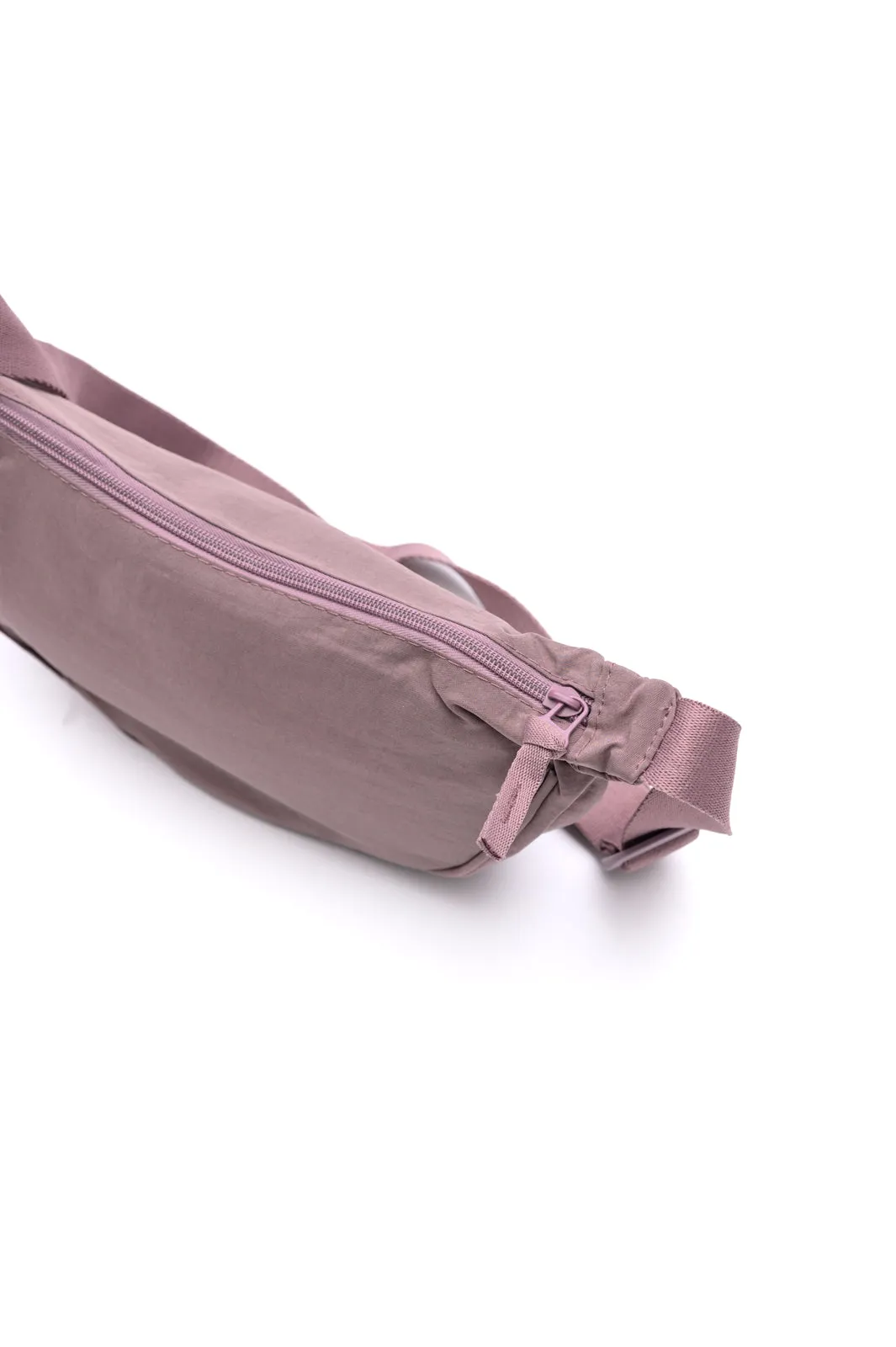 Essentially Everything Round Mini Crossbody Bag in Lavender sold by Charming Charlie product image thumbnail 4