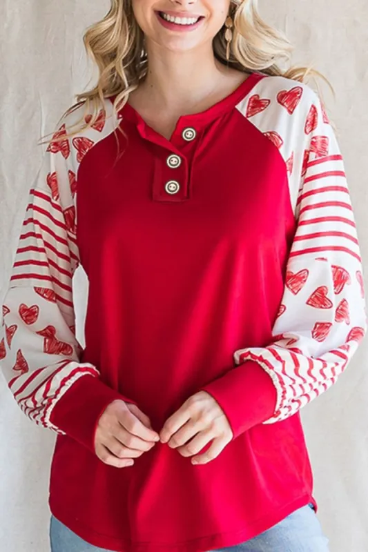 Heart Printed Round Neck Long Sleeve T-Shirt sold by Charming Charlie