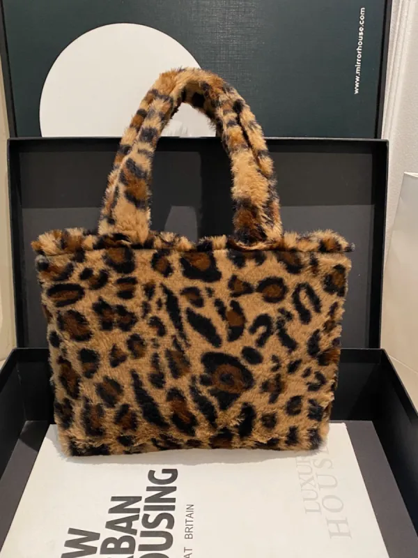 Leopard Fluff Handbag with Zip sold by Charming Charlie