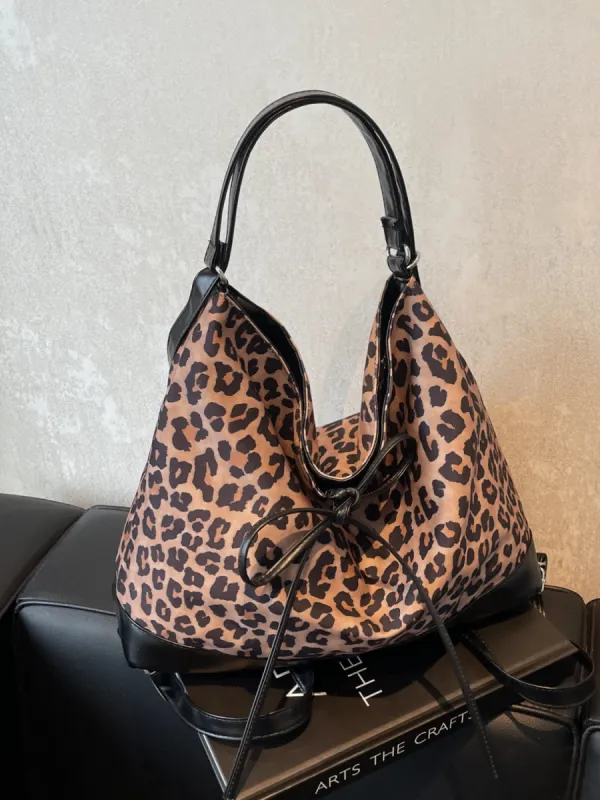 Leopard Dual Purpose Crossbody Bag sold by Charming Charlie