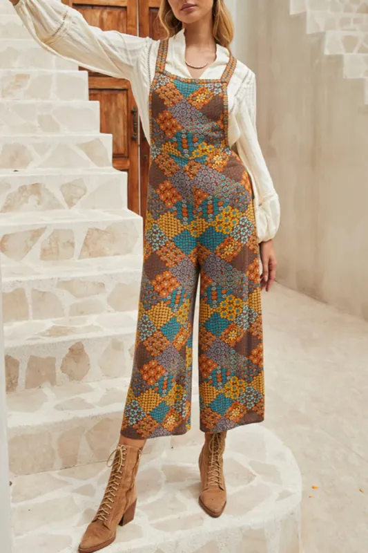 Floral Crisscross Strap Wide Leg Overalls sold by Charming Charlie