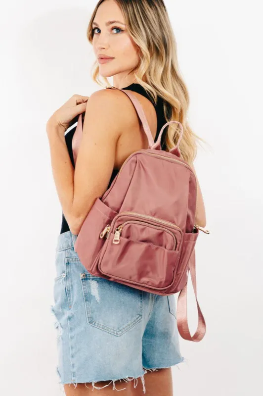 Fame Multi Pocket Nylon Backpack Bag sold by Charming Charlie