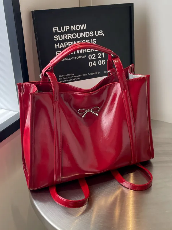 PU Leather Bow Shoulder Bag sold by Charming Charlie