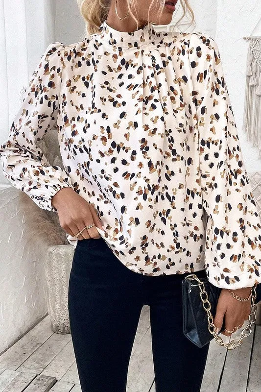 Leopard Print Puff Sleeve Mock Neck Pleated Blouse sold by Charming Charlie