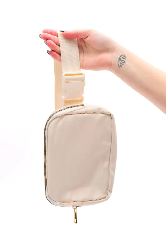 Everywhere I Go Crossbody Belt Bag in Ivory sold by Charming Charlie
