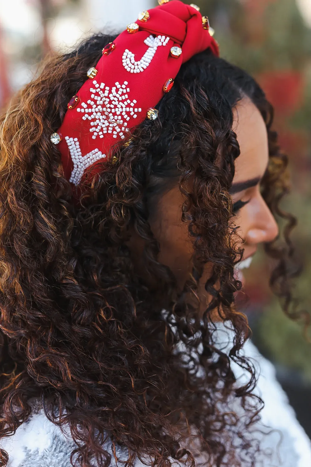 Red Snowflake Jeweled Christmas Top Knot Headband sold by Charming Charlie product image thumbnail 2
