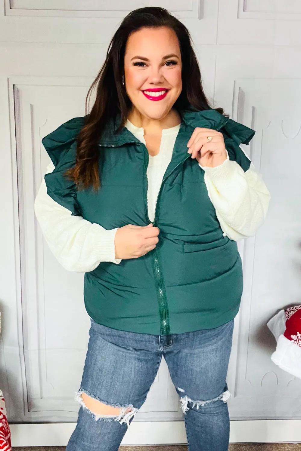 Feeling Festive Hunter Green Zipper Up Quilted Ruffle Sleeve Puffer Vest sold by Charming Charlie