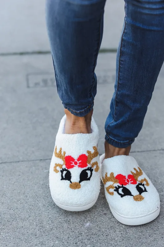 Christmas Reindeer Print Fleece Slippers sold by Charming Charlie