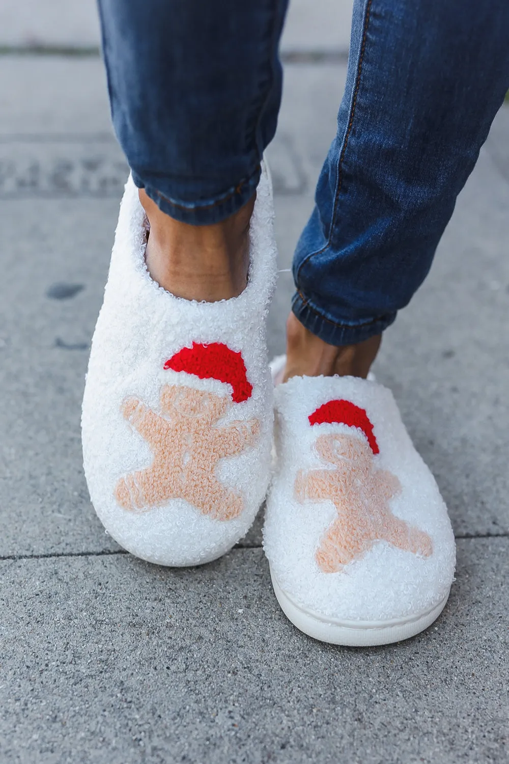Holiday Gingerbread Man Print Fleece Slippers sold by Charming Charlie