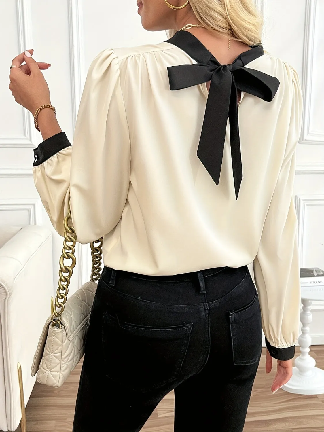Bow Contrast Mock Neck Long Sleeve Blouse sold by Charming Charlie