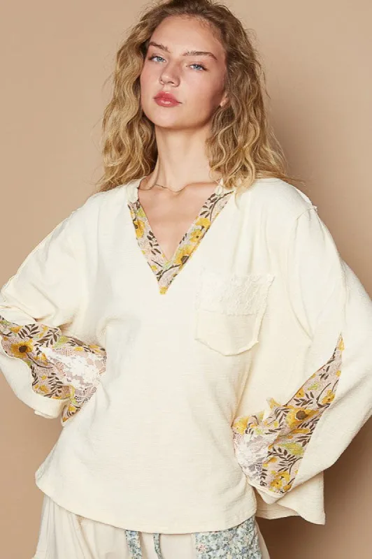 POL Lace Detail Flower Printed V-Neck Knit Top sold by Charming Charlie
