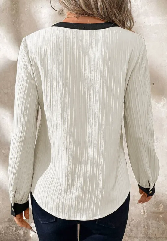 Contrast Notched Long Sleeve Blouse sold by Charming Charlie product image thumbnail 5