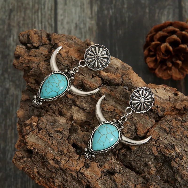 Artificial Turquoise Alloy Cow Head Earrings sold by Charming Charlie