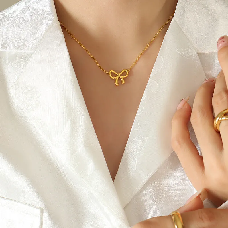 Titanium Steel Bow Pendant Necklace sold by Charming Charlie product image thumbnail 2