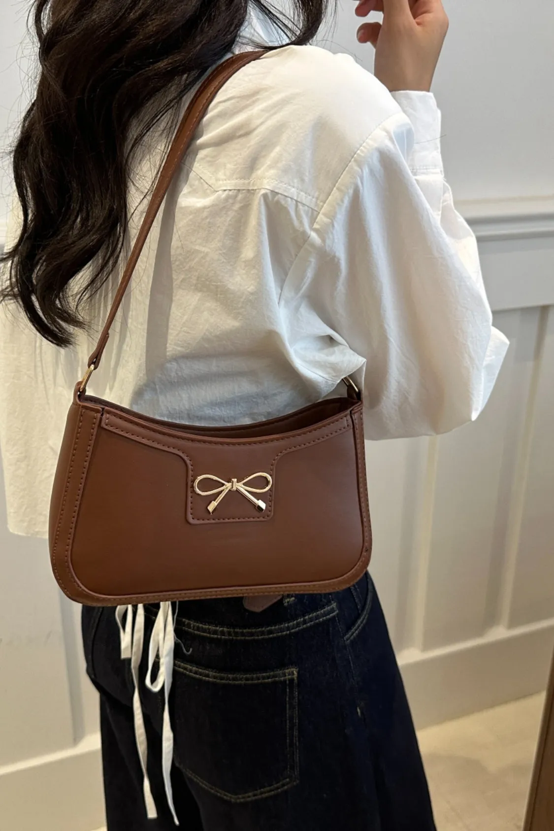 Bow Trim PU Leather Shoulder Bag sold by Charming Charlie