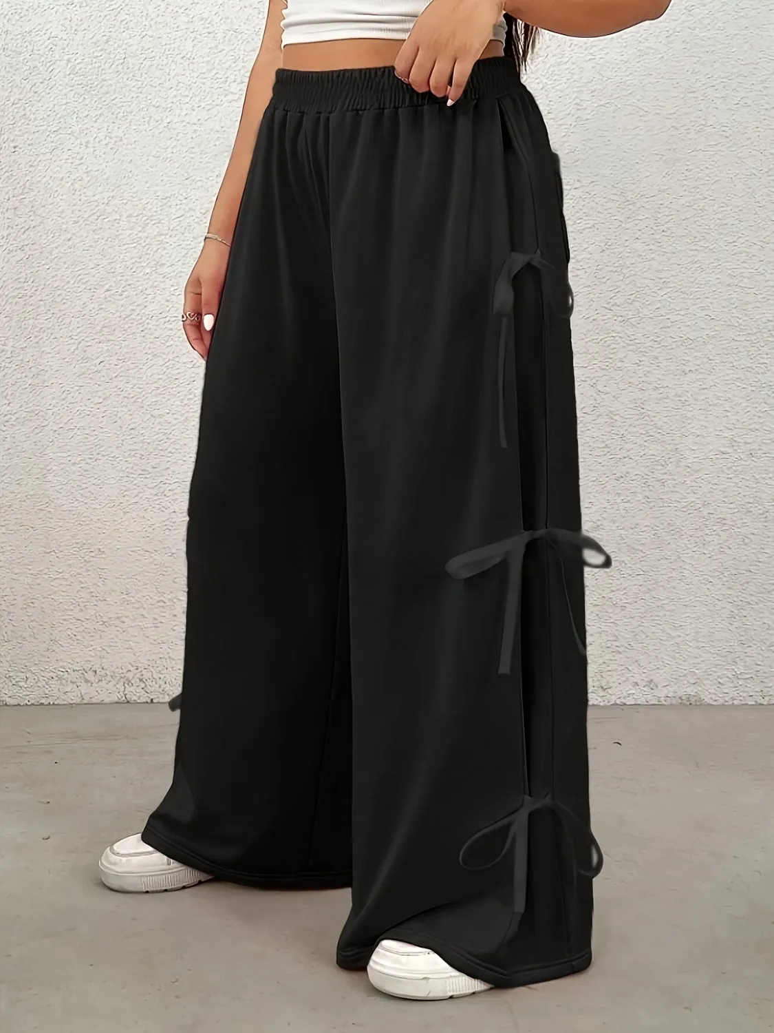 Plus Size Bow Elastic Waist Wide Leg Pants sold by Charming Charlie