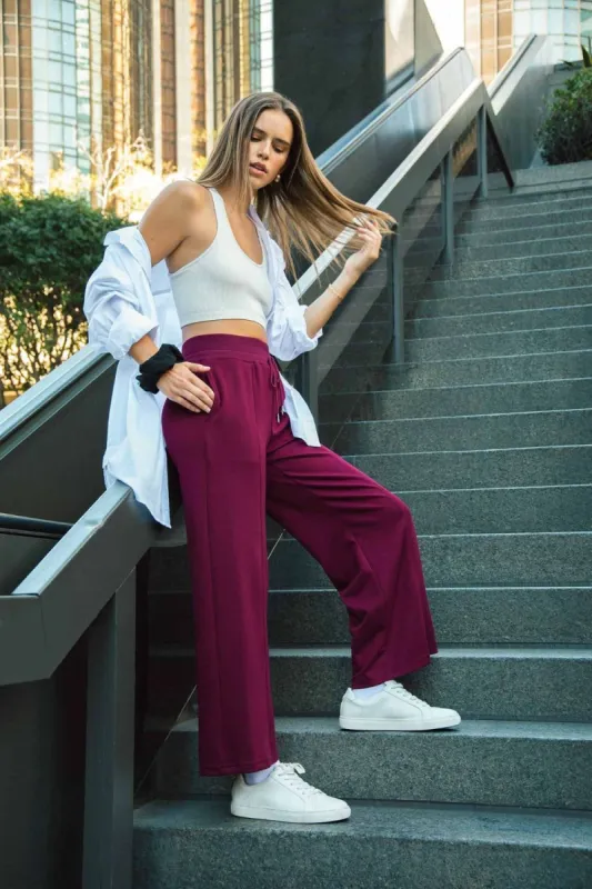 Umgee Full Size Drawstring Wide Leg Pants with Pockets sold by Charming Charlie