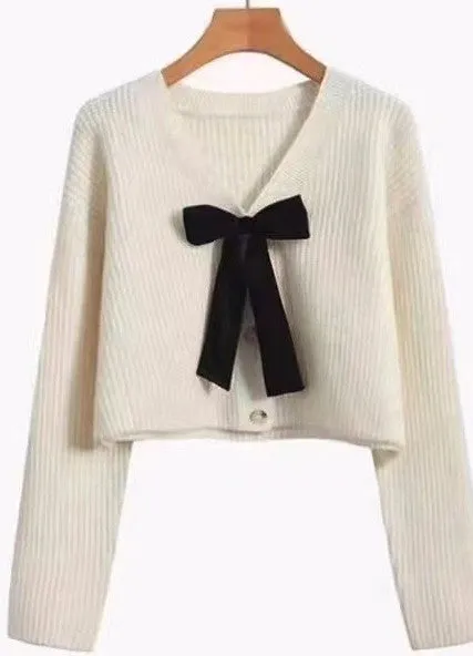 Bow Tie V-Neck Cropped Cardigan sold by Charming Charlie