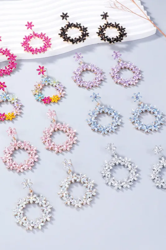 Rhinestone Flower Dangle Earrings sold by Charming Charlie