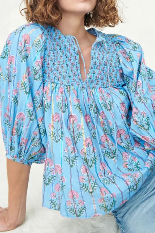 Smocked Floral Print Tie Neck Blouse sold by Charming Charlie