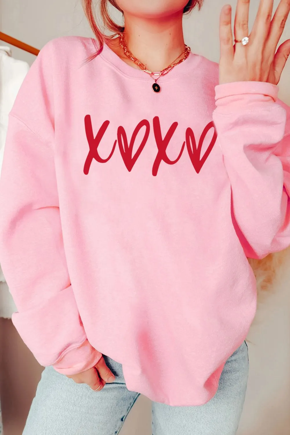Valentine’s Day XOXO Round Neck Drop Shoulder Sweatshirt sold by Charming Charlie