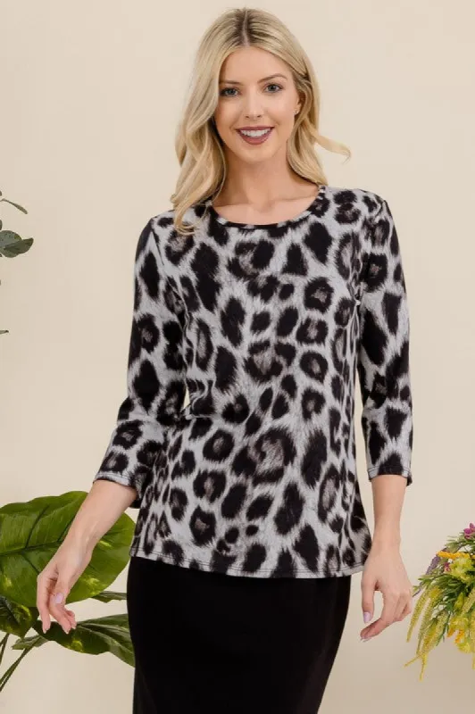 Celeste Full Size Leopard Round Neck Three-Quarter Sleeve T-Shirt sold by Charming Charlie