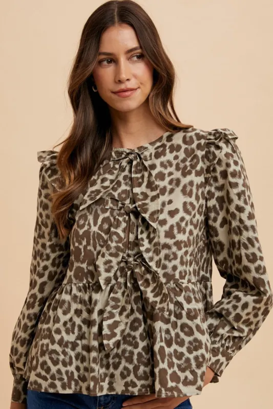 Annie Wear Tied Leopard Round Neck Peplum Blouse sold by Charming Charlie