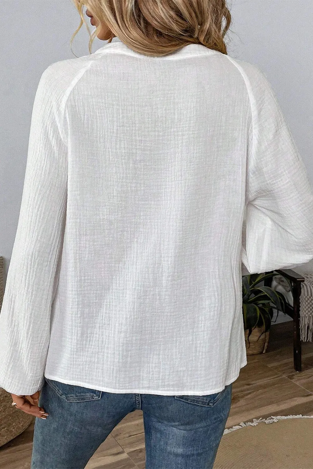 Embroidered Notched Long Sleeve Blouse sold by Charming Charlie product image thumbnail 2