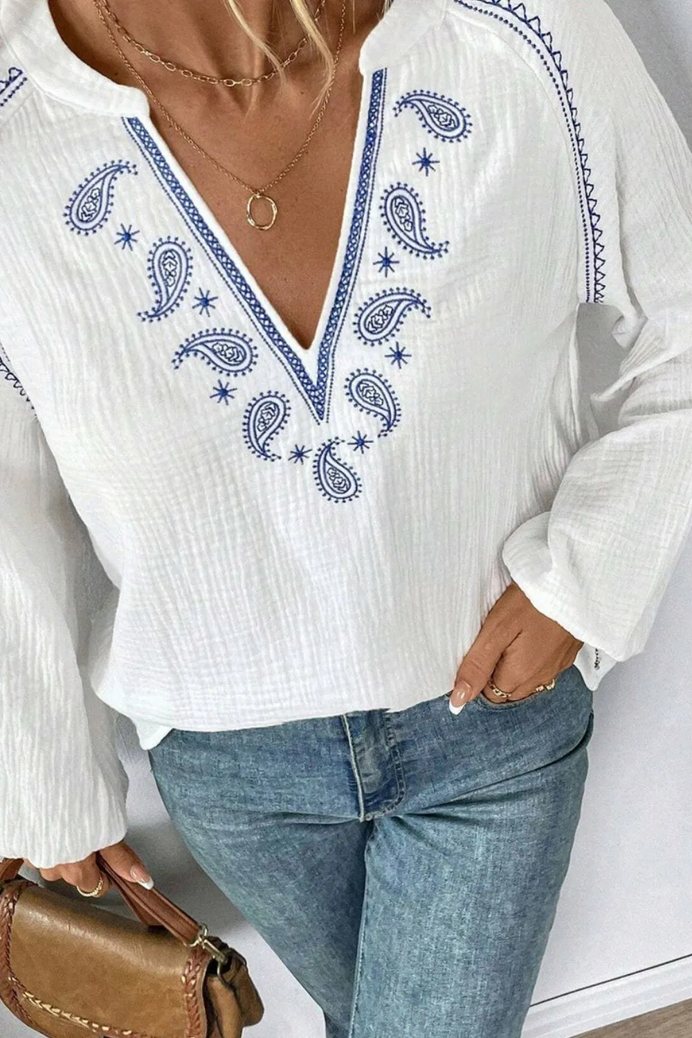 Embroidered Notched Long Sleeve Blouse sold by Charming Charlie product image thumbnail 3