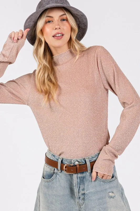 SAGE + FIG Glitter Mock Neck Lettuce Hem Long Sleeve Top sold by Charming Charlie