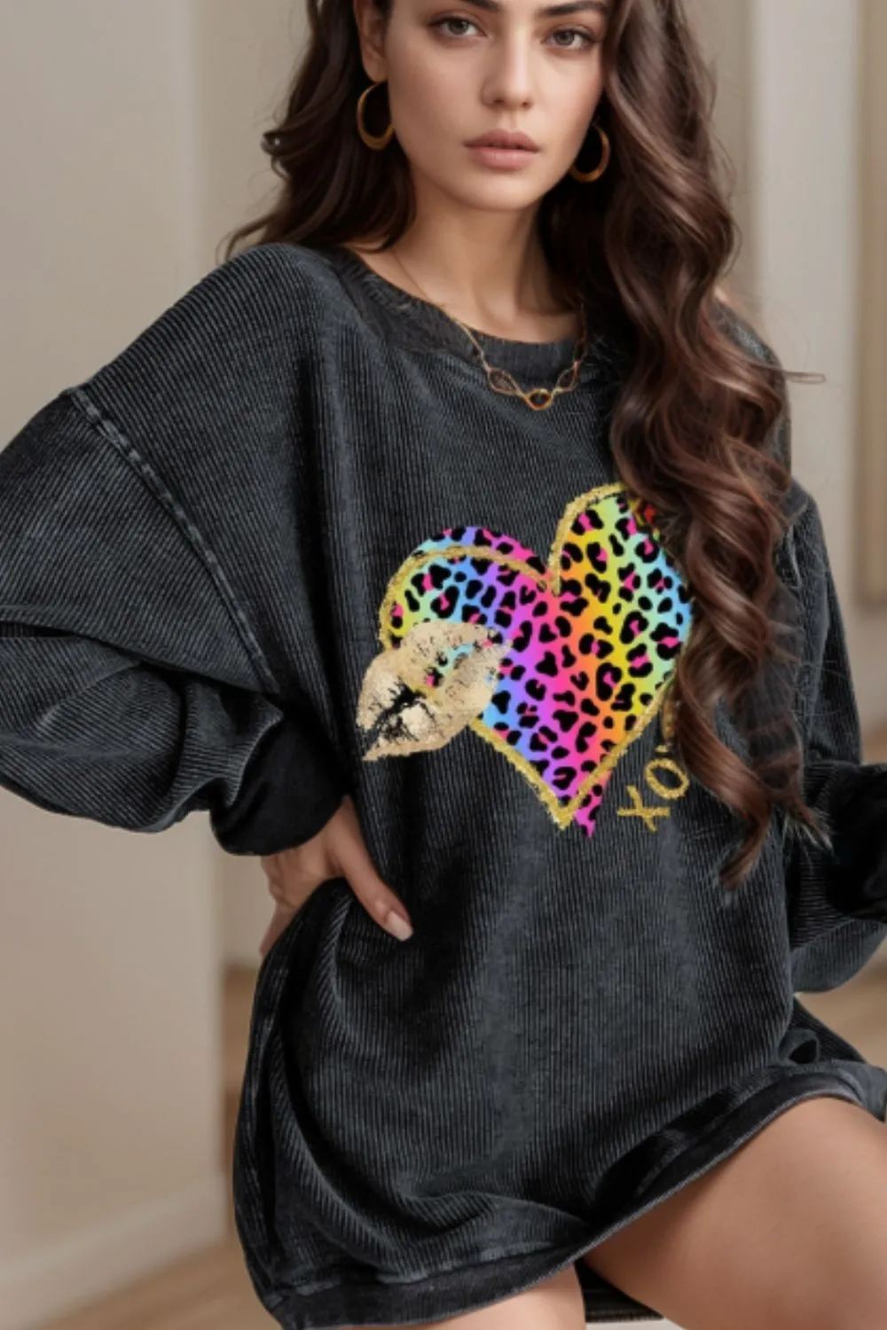 Leopard Heart Drop Shoulder Long Sleeve Sweatshirt sold by Charming Charlie