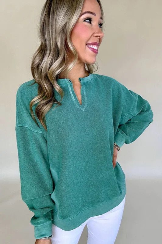 Solid Color Notched Neck Drop Shoulder Sweatshirt sold by Charming Charlie