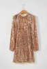 Backless Sequin Mock Neck Long Sleeve Mini Dress sold by Charming Charlie