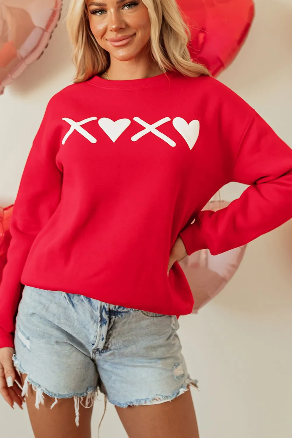 Valentine’s Day XOXO Round Neck Drop Shoulder Sweatshirt sold by Charming Charlie product image thumbnail 4