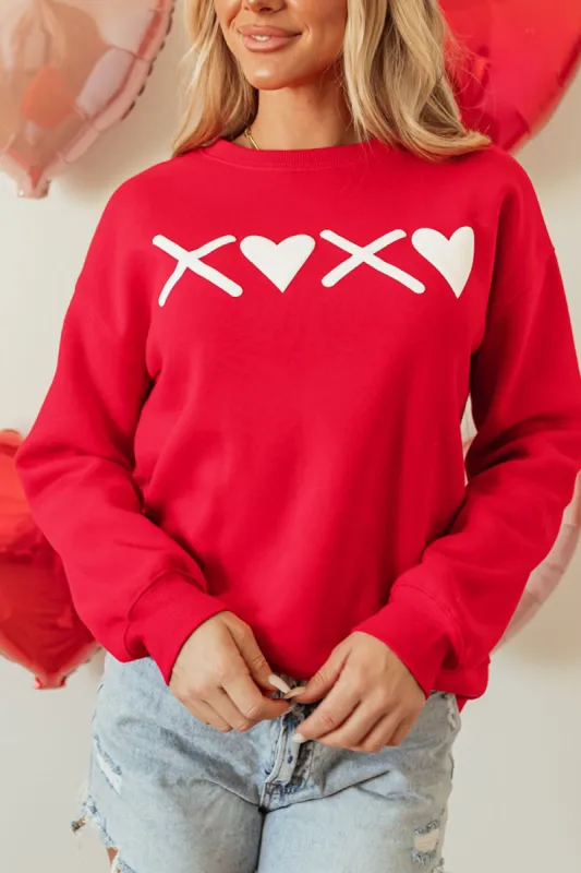 Valentine’s Day XOXO Round Neck Drop Shoulder Sweatshirt sold by Charming Charlie