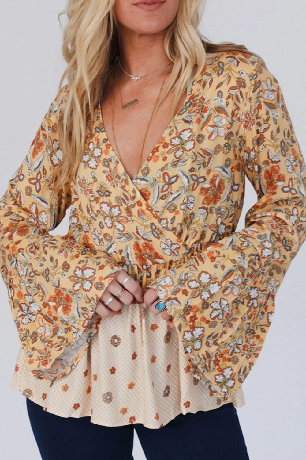 Peplum Printed Surplice Flare Sleeve Blouse sold by Charming Charlie product image thumbnail 2