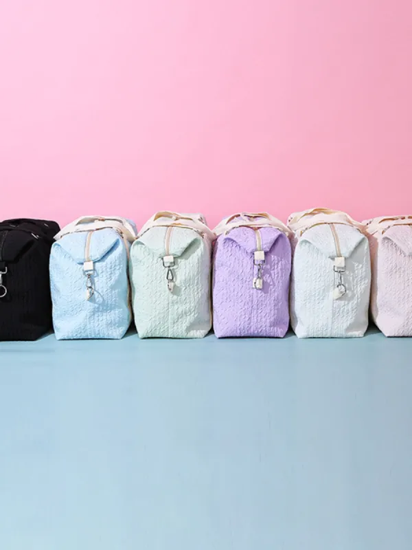 Texture Oxford Cloth Travel Bag sold by Charming Charlie