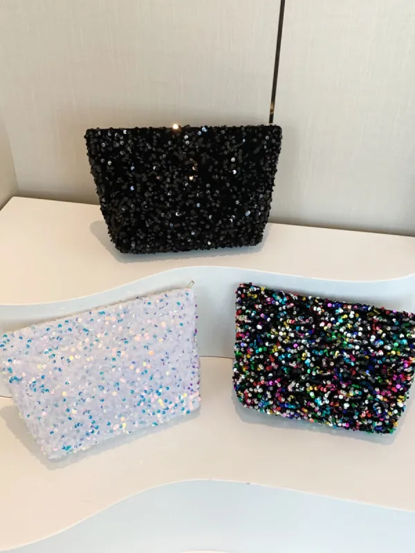 Sequin Clutch with Zipper sold by Charming Charlie
