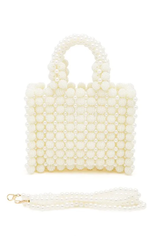 Braided Pearl Structure Top Handle Clutch Bag sold by Charming Charlie