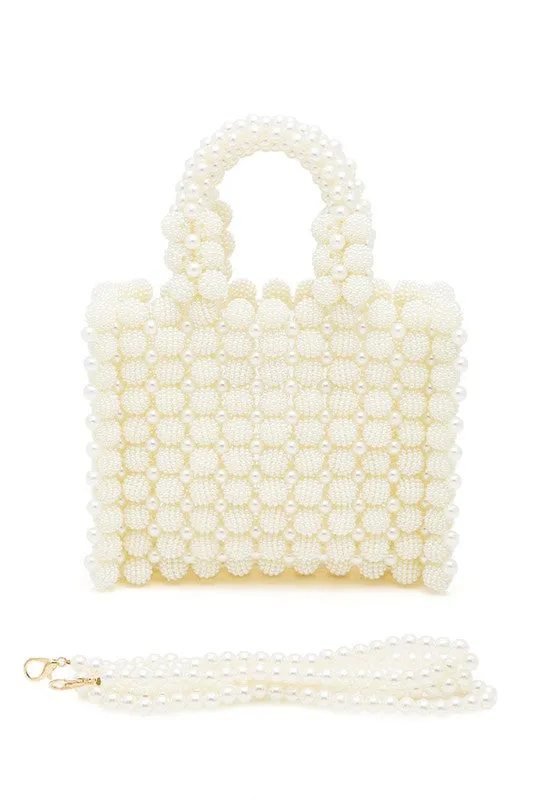 Braided Pearl Structure Top Handle Clutch Bag sold by Charming Charlie