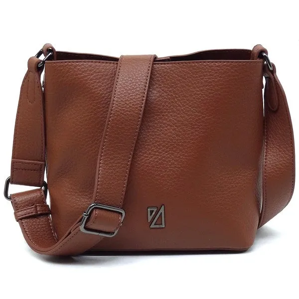 IZA CO Bucket Crossbody Bag sold by Charming Charlie