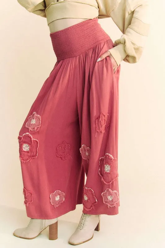 Davi & Dani Smocked Waist Flower Patch Wide Leg Pants sold by Charming Charlie
