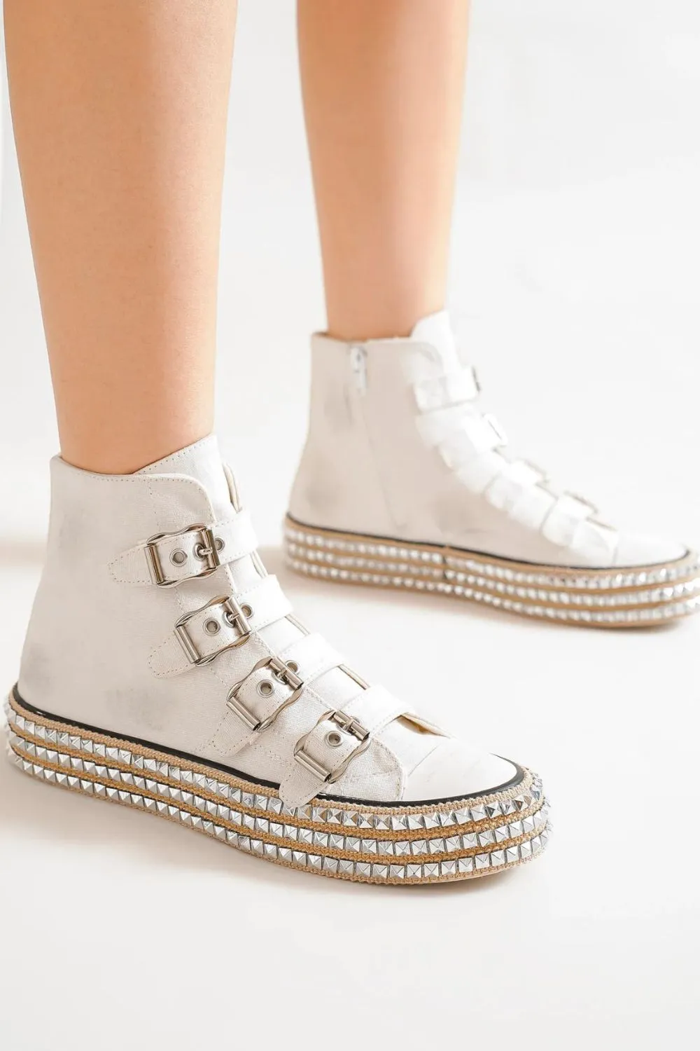 Beast Fashion Multi-Buckle Straps Studded Platform Sneakers sold by Charming Charlie