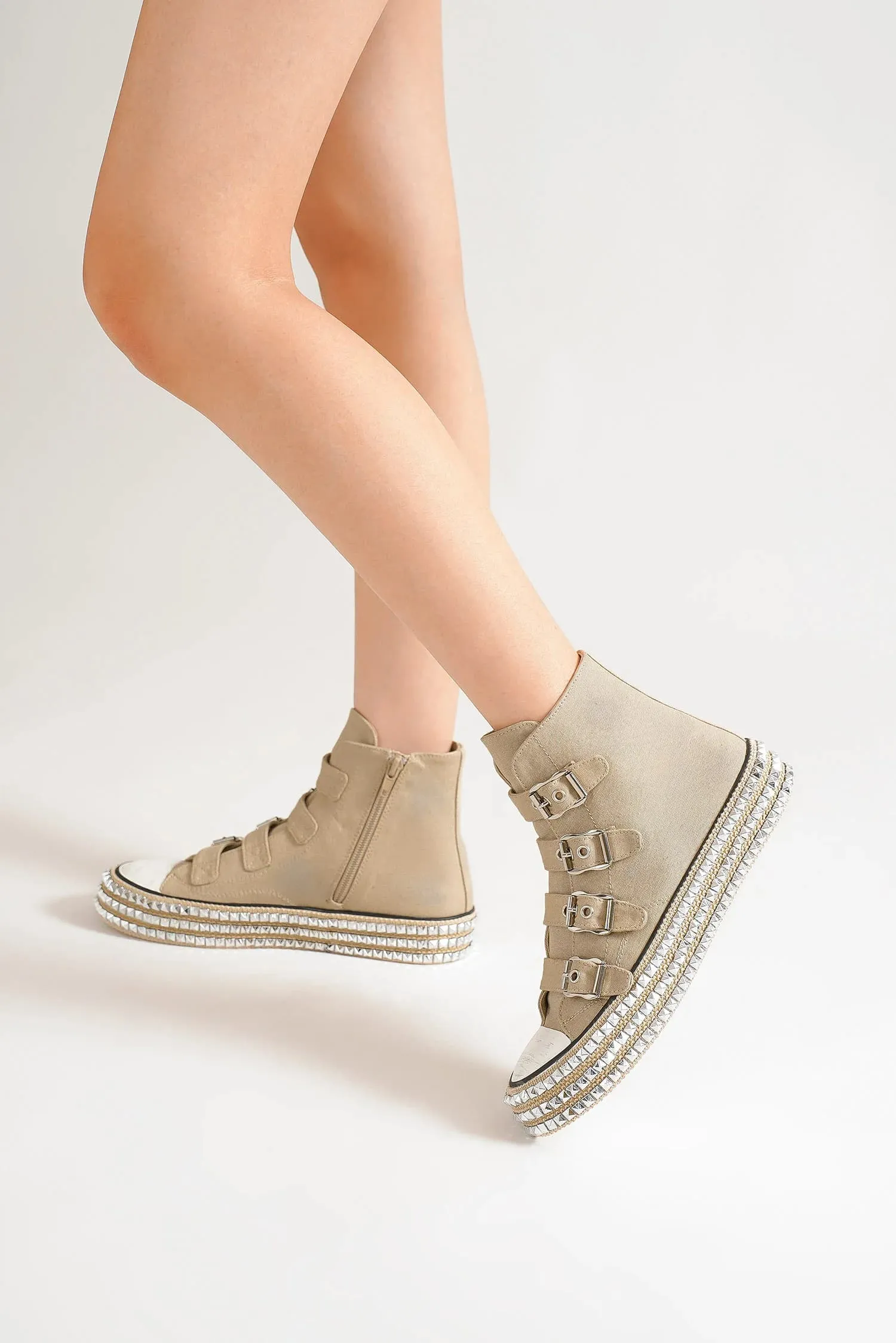 Beast Fashion Multi-Buckle Straps Studded Platform Sneakers sold by Charming Charlie