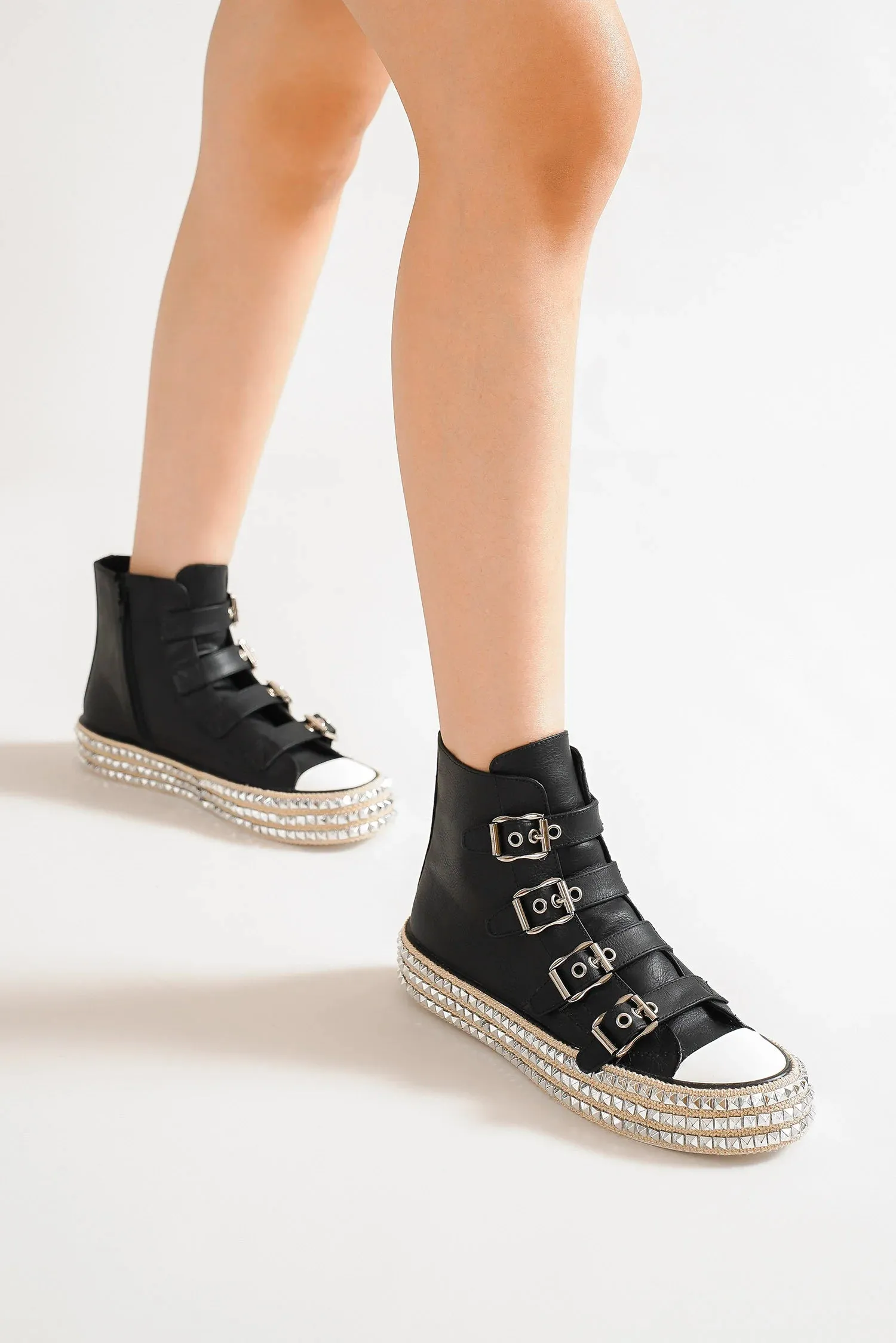 Beast Fashion Multi-Buckle Straps Studded Platform Sneakers sold by Charming Charlie