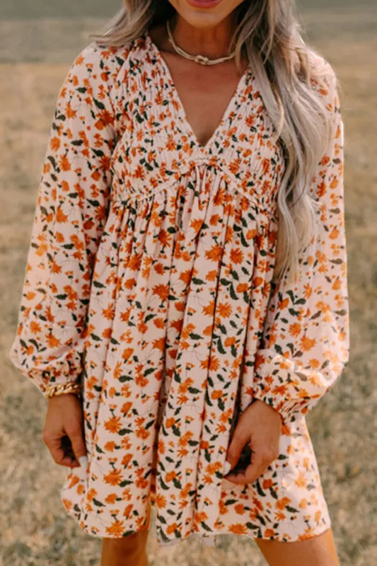 Smocked Printed V-Neck Long Sleeve Dress sold by Charming Charlie