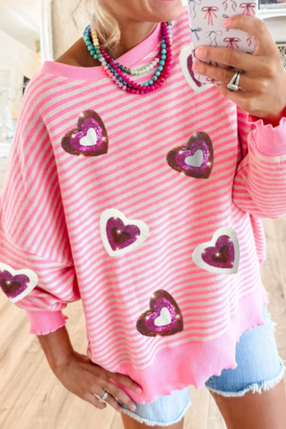 Valentine’s Day Sequin Heart Striped Round Neck Long Sleeve Sweatshirt sold by Charming Charlie